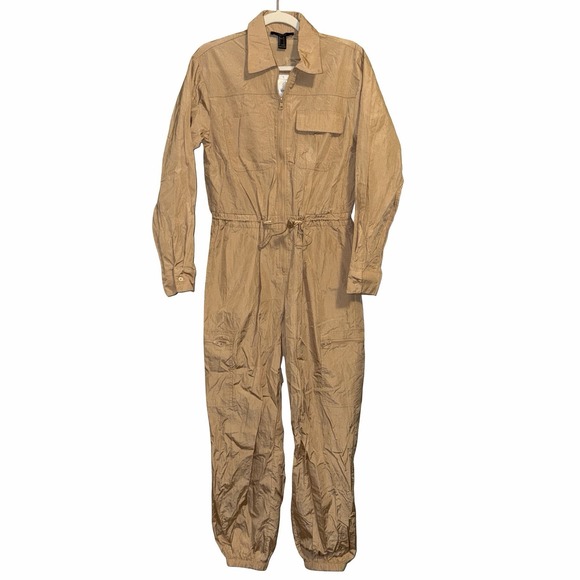 Forever 21 Pants - NWT Forever 21 Nylon Beige Jumpsuit. Size Small Light Weight‎